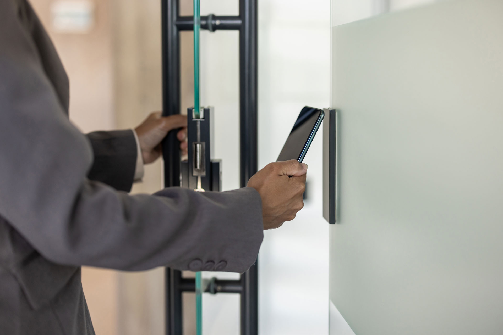 Person using smartphone for secure door access