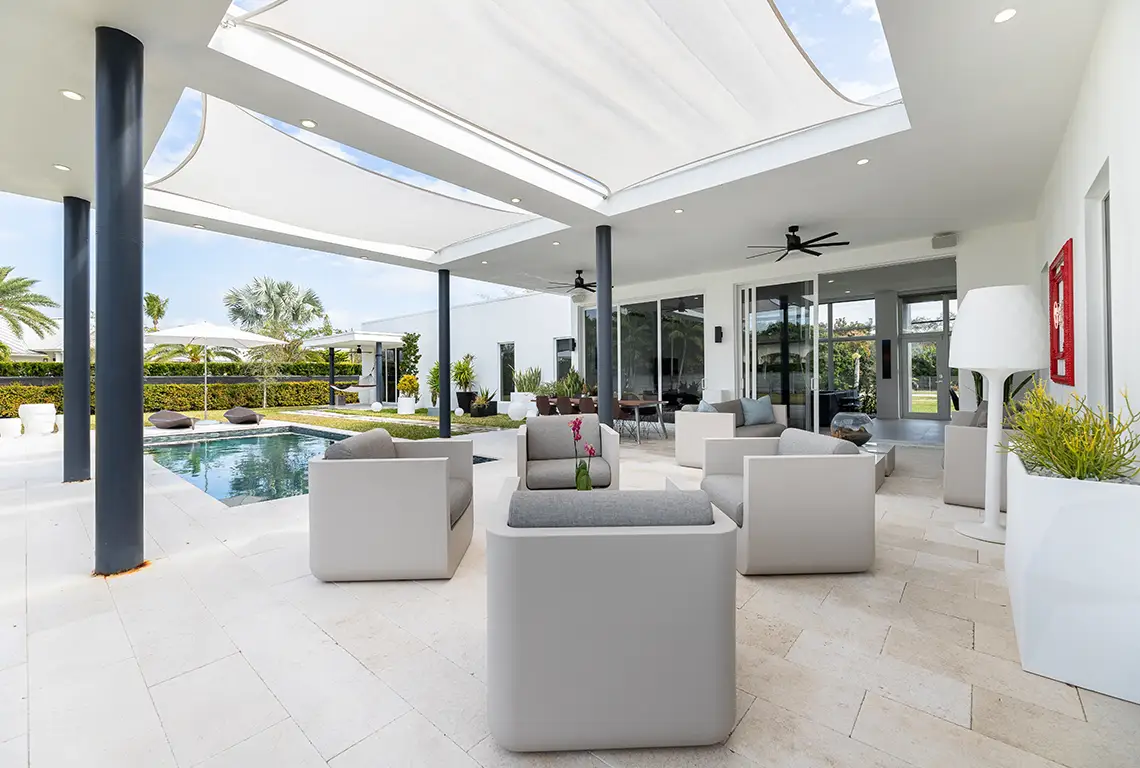 Modern patio with pool and outdoor seating area