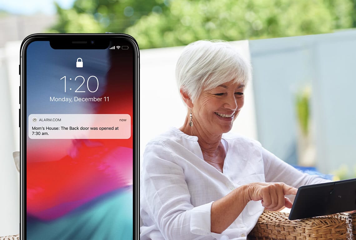 Alarm.com alert and elderly woman