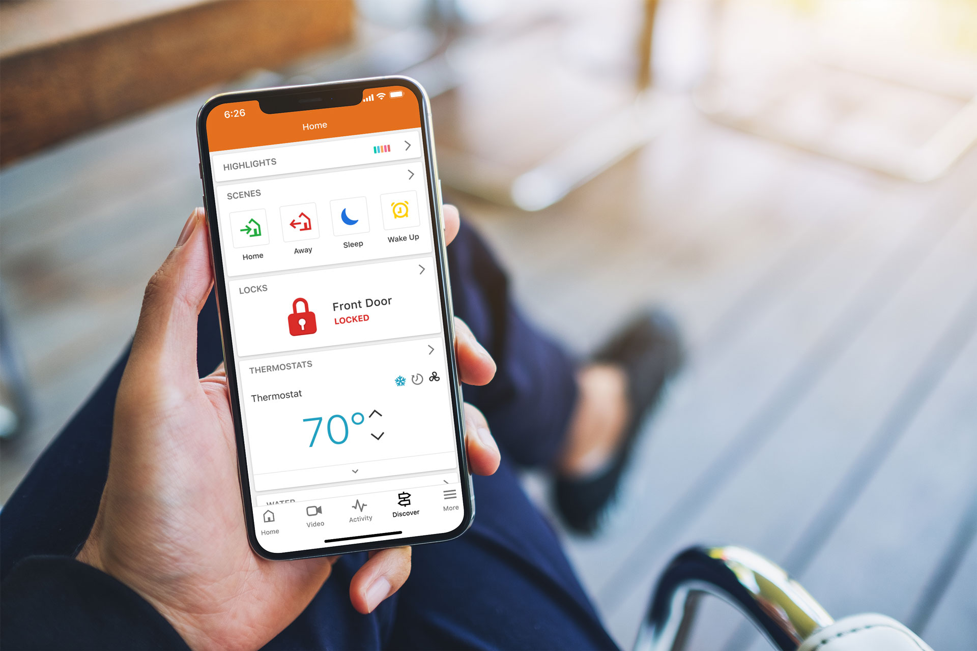 Smartphone displaying smart home control app interface